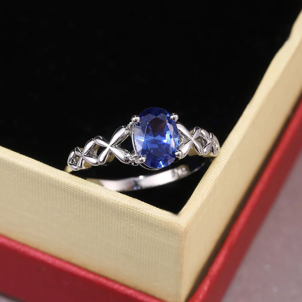 Huitan Deep Blue Zirconia Women's Ring – 4-Prong Classic Fashion Ring Axl F173 Silver Plated 6