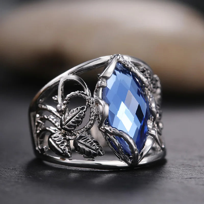 Huitan Wide Women's Ring – Blue CZ Hollow Leaf Geometric Band Fashion Ring Axl