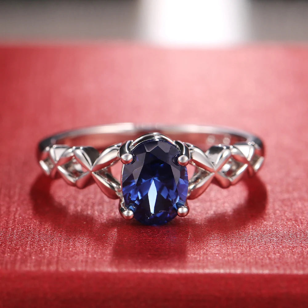 Huitan Deep Blue Zirconia Women's Ring – 4-Prong Classic Fashion Ring Axl