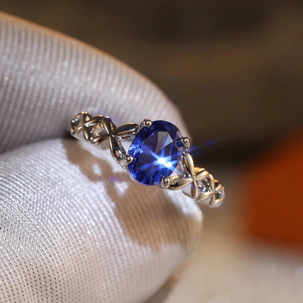 Huitan Deep Blue Zirconia Women's Ring – 4-Prong Classic Fashion Ring Axl