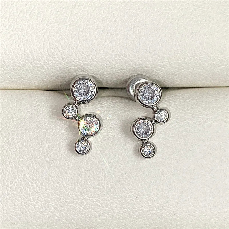 Huitan Geometric CZ Stud Earrings – Silver Plated Women's Studs CZ Stud Earrings Axl
