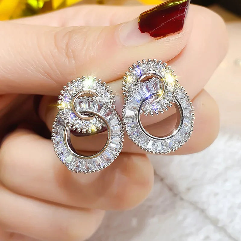 Huitan Crystal Cubic Zirconia Figure-8 Stud Earrings Women Crystal Stud Earrings Axl Silver Plated WHITE