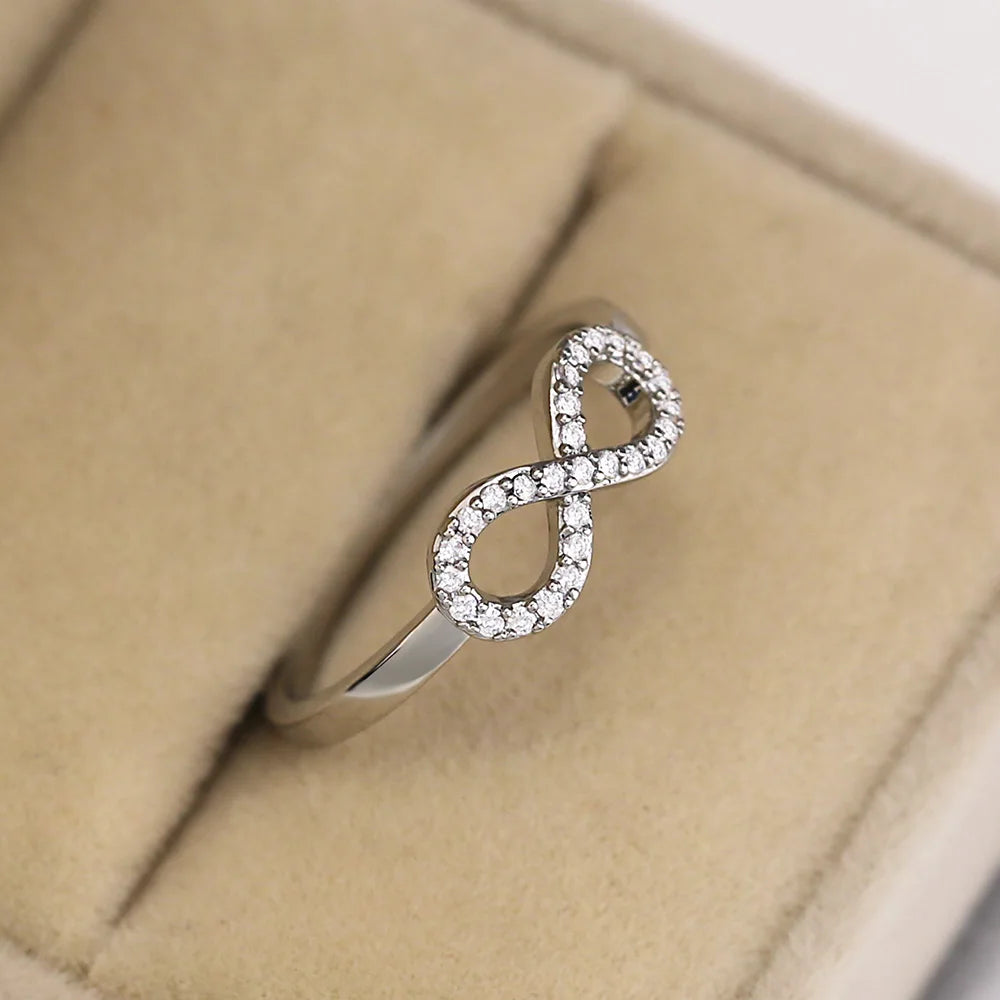 Huitan Infinity Ring Women – Cubic Zirconia Figure-8 Band Fashion Ring Axl
