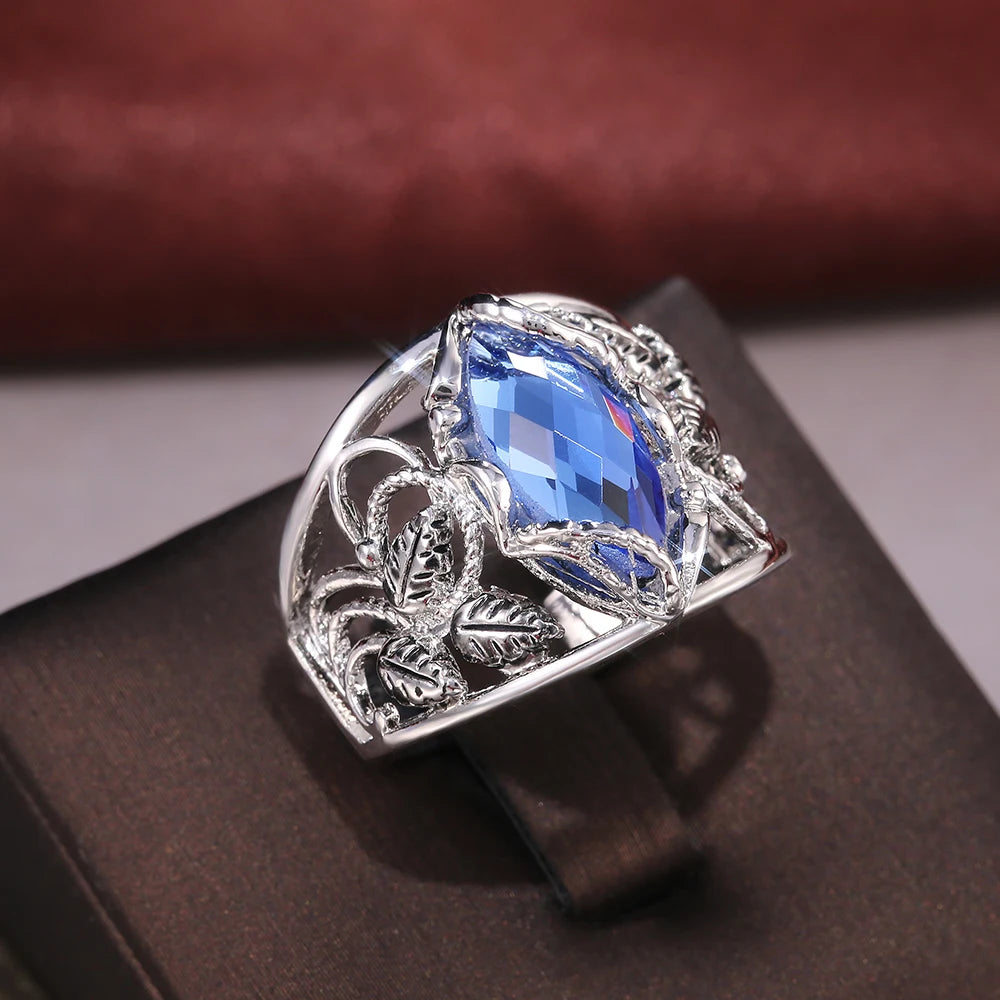 Huitan Wide Women's Ring – Blue CZ Hollow Leaf Geometric Band Fashion Ring Axl