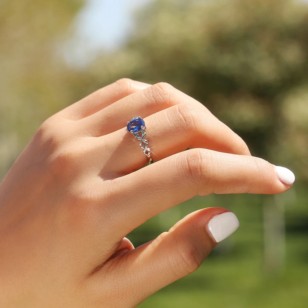 Huitan Deep Blue Zirconia Women's Ring – 4-Prong Classic Fashion Ring Axl