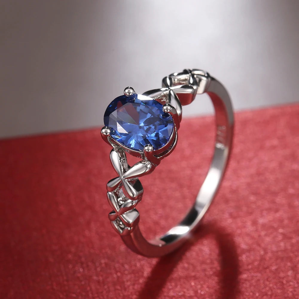 Huitan Deep Blue Zirconia Women's Ring – 4-Prong Classic Fashion Ring Axl