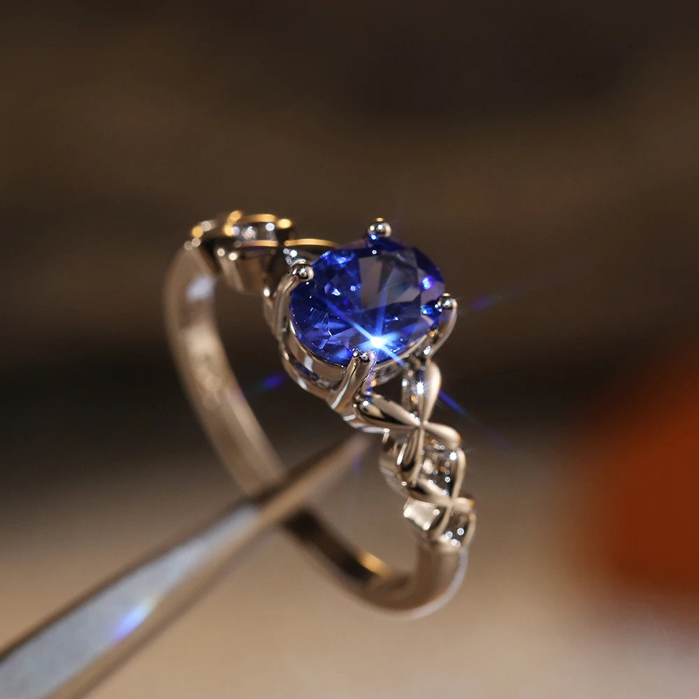 Huitan Deep Blue Zirconia Women's Ring – 4-Prong Classic Fashion Ring Axl