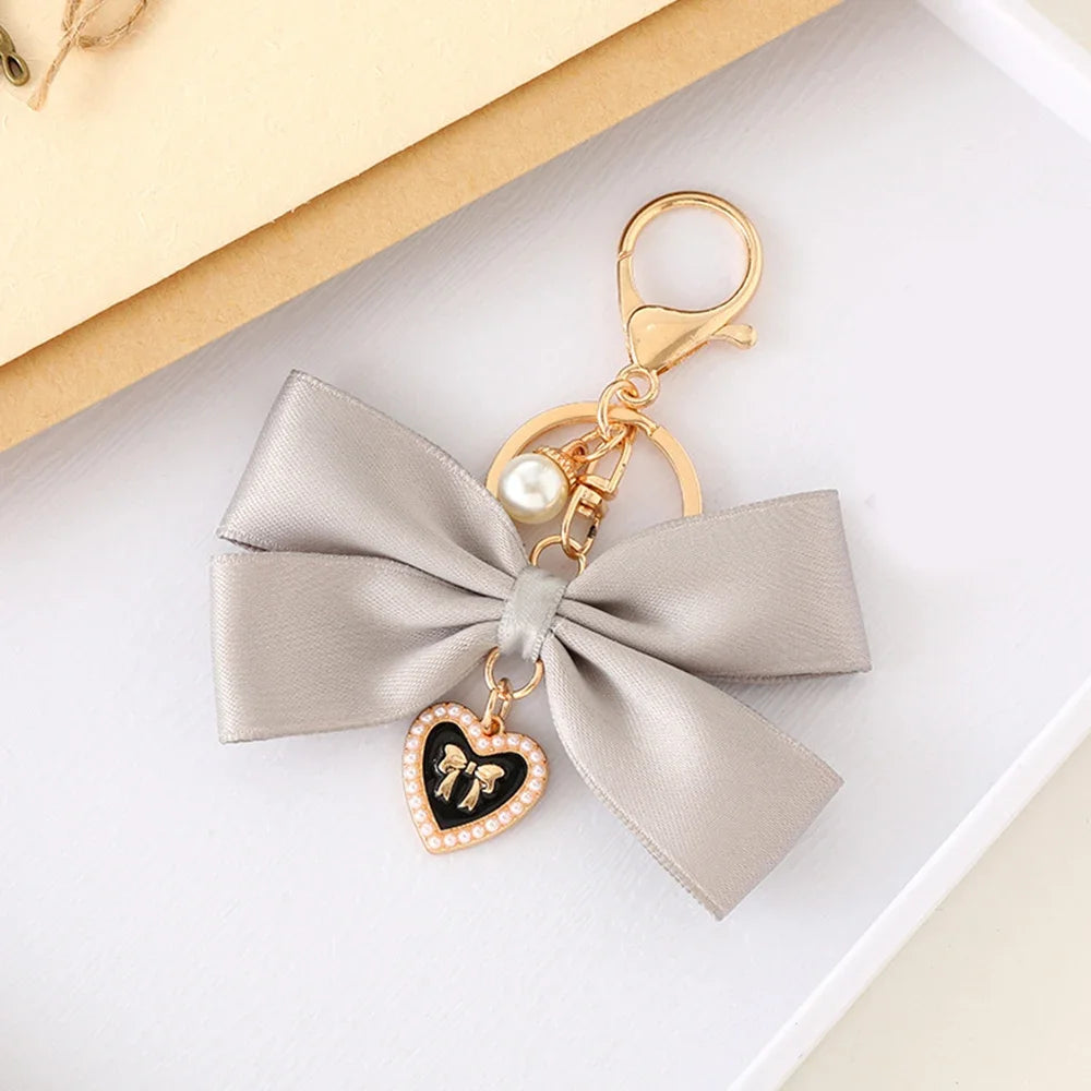 Imitation Pearl Keychain Ribbon Bowknot Bag Charm for Women Fashion Keychain Axl grey 1pc