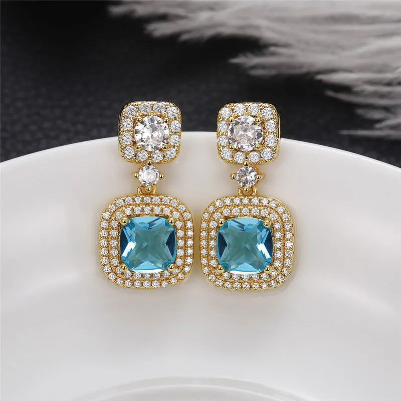 Huitan Gold Blue CZ Dangle Earrings – Luxury Drop Jewelry Dangle Drop Earrings Axl