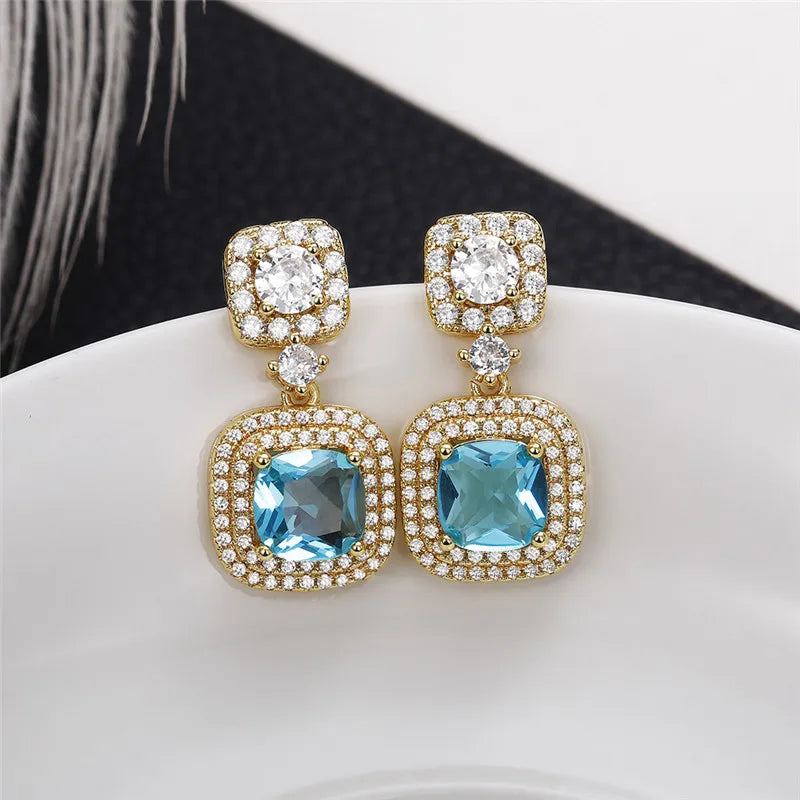 Huitan Gold Blue CZ Dangle Earrings – Luxury Drop Jewelry Dangle Drop Earrings Axl
