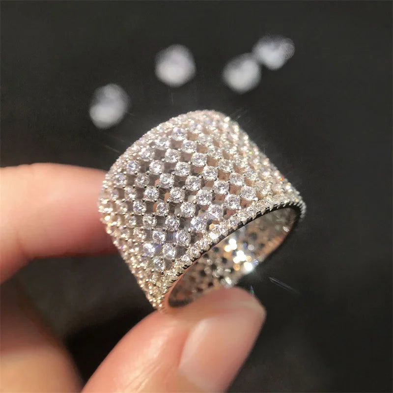 Huitan Iced Out CZ Ring – Silver Wedding Band for Women CZ Fashion Ring Axl