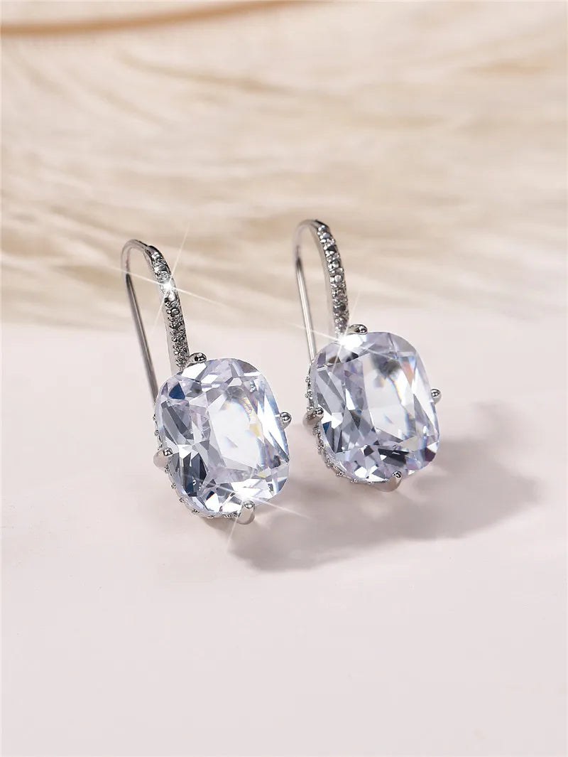 Huitan Women's CZ Geometric Dangle Earrings – Silver Tone Dangle Earrings Axl