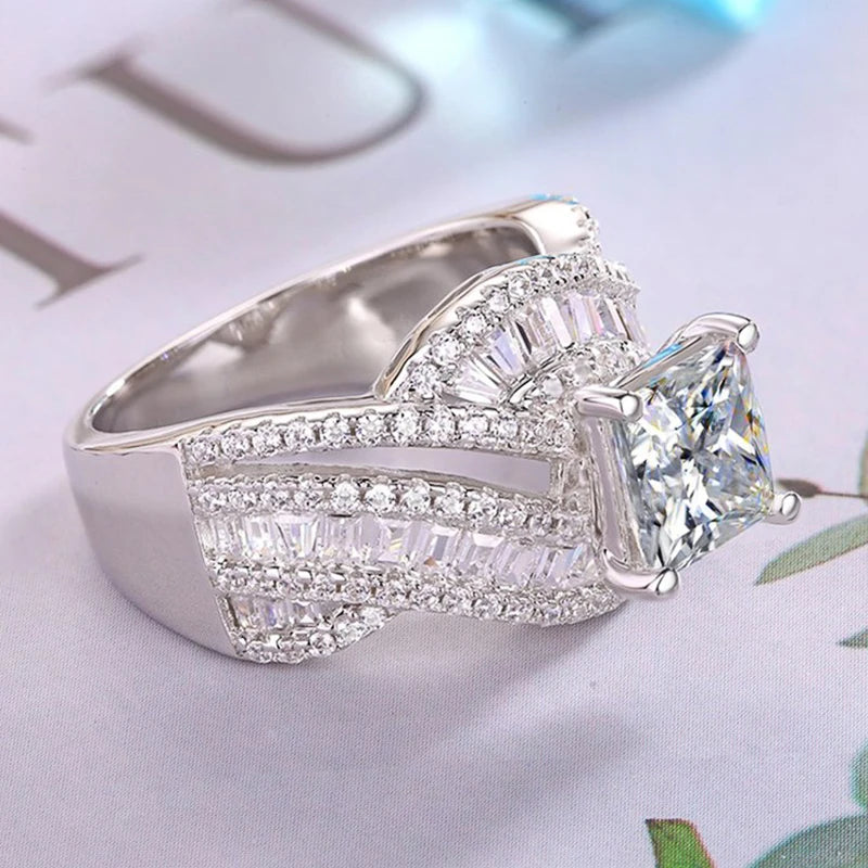 Huitan Women's Iced Out CZ Wedding Ring | Fashion Band CZ Fashion Ring Axl