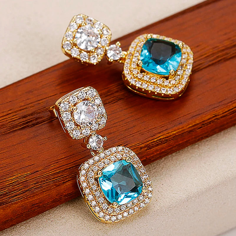 Huitan Gold Blue CZ Dangle Earrings – Luxury Drop Jewelry Dangle Drop Earrings Axl E1700