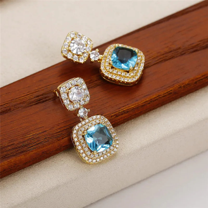 Huitan Gold Blue CZ Dangle Earrings – Luxury Drop Jewelry Dangle Drop Earrings Axl