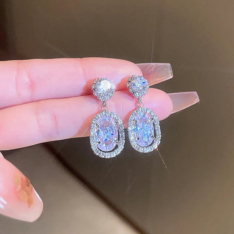 Huitan Oval CZ Dangle Earrings – Silver Drop Earrings for Women Drop Dangle Earrings Axl E2434