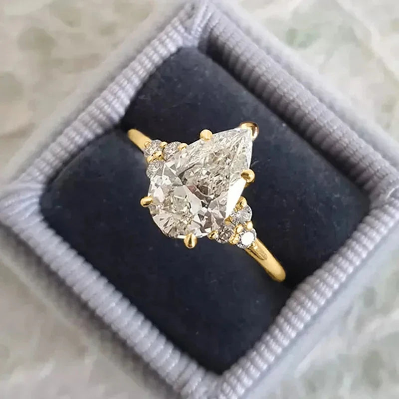Huitan Gold Waterdrop Cubic Zirconia Ring – Women's Wedding Band CZ Fashion Ring Axl