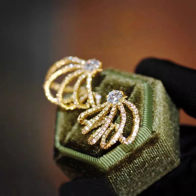 Huitan Hollow Claw Cubic Zirconia Stud Earrings for Women Stud Earrings Axl